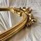 Baroque wall mirror in gilded plaster - height: 62 cm