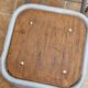 Set of four stackable industrial tubular metal and wood stools