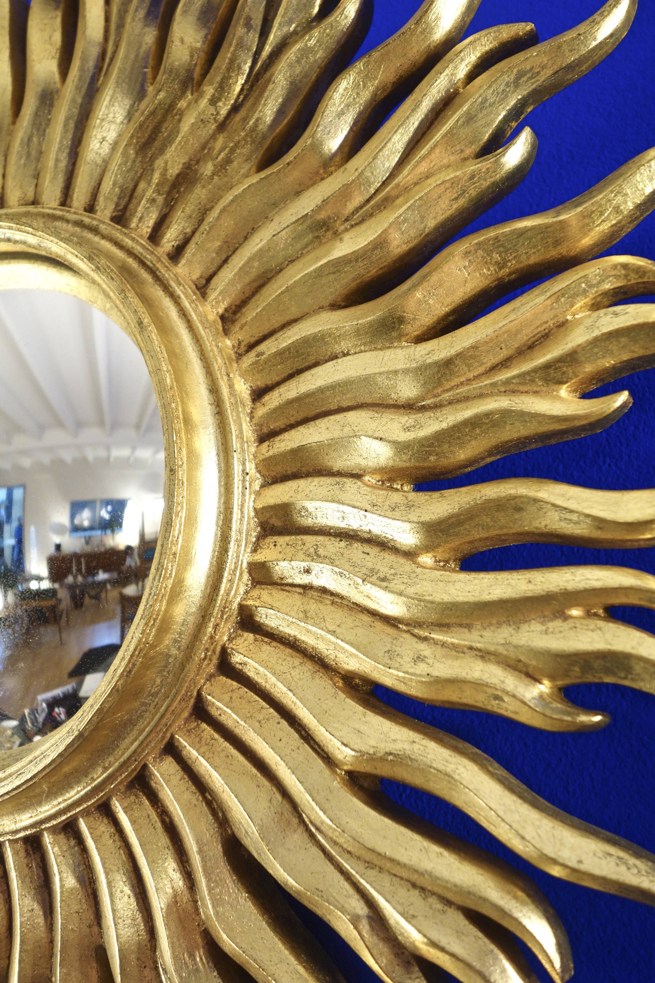 Vintage convex sun mirror in gilded wood, France 1960's