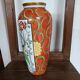 Jean Boyer porcelain vase with floral and vegetal decoration and bird of paradise