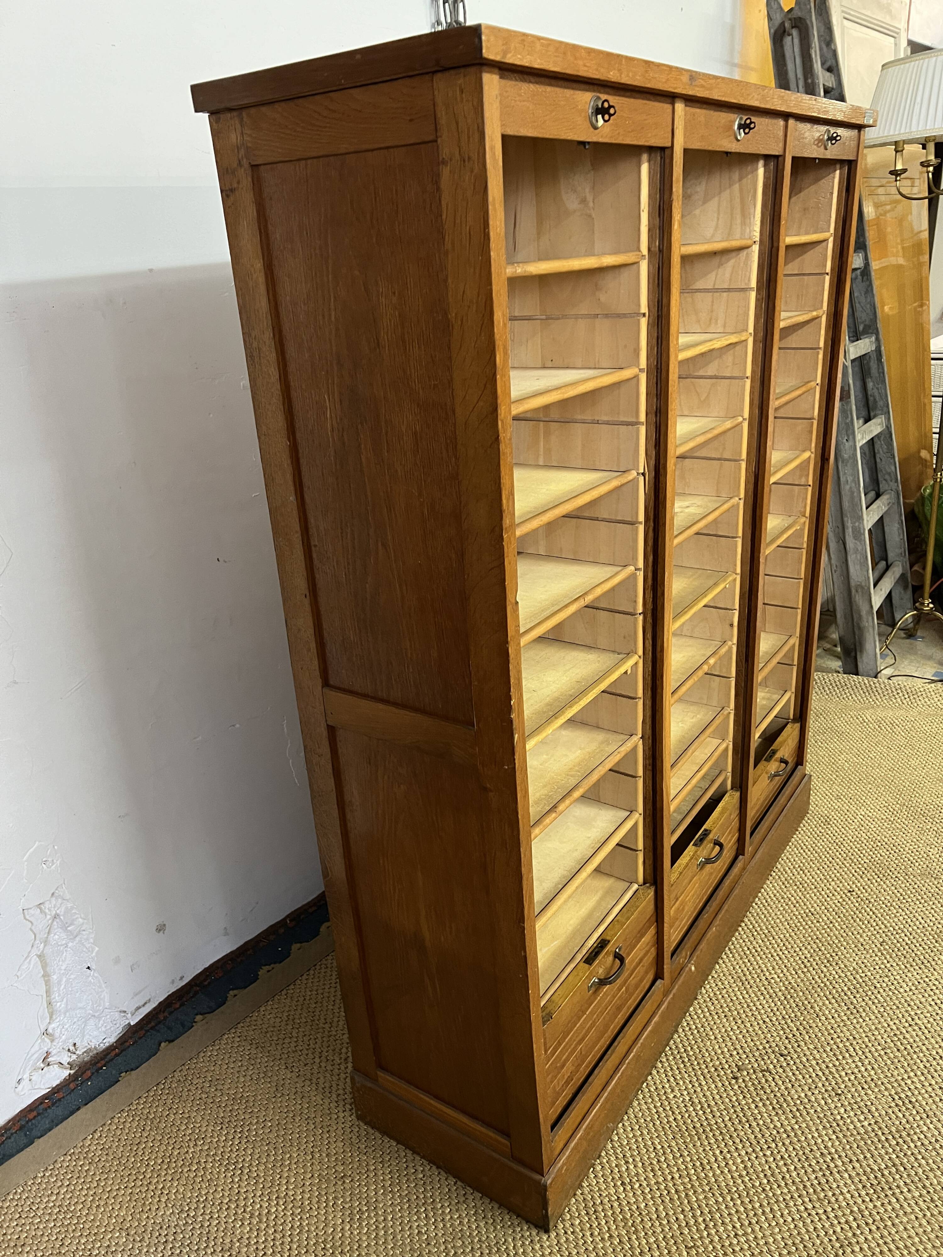 Old filing cabinet with triple curtains