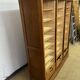 Old filing cabinet with triple curtains