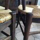 Paire de fauteuils paillés