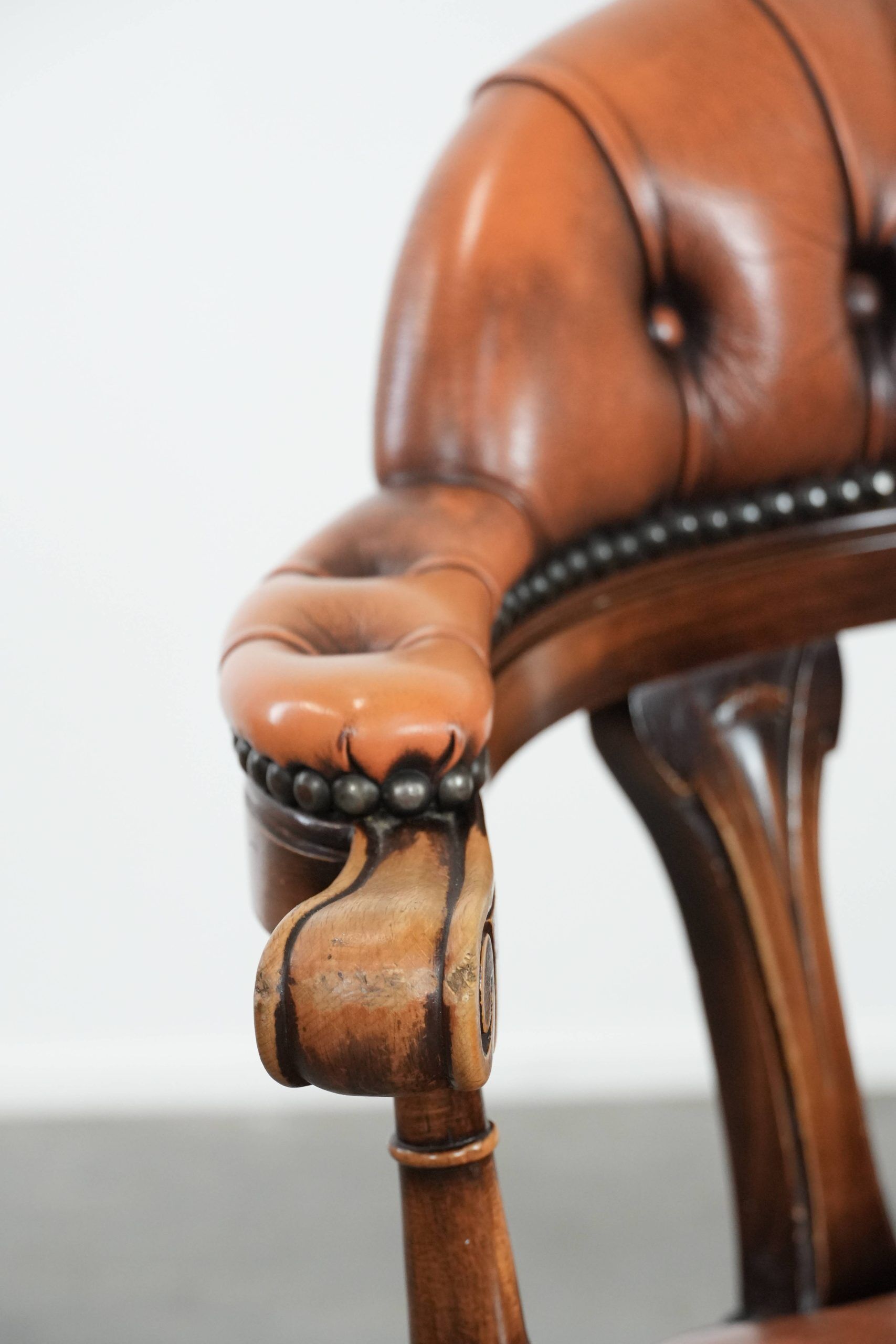 Classic and timeless cow leather and wooden Chesterfield office chair
