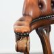 Classic and timeless cow leather and wooden Chesterfield office chair