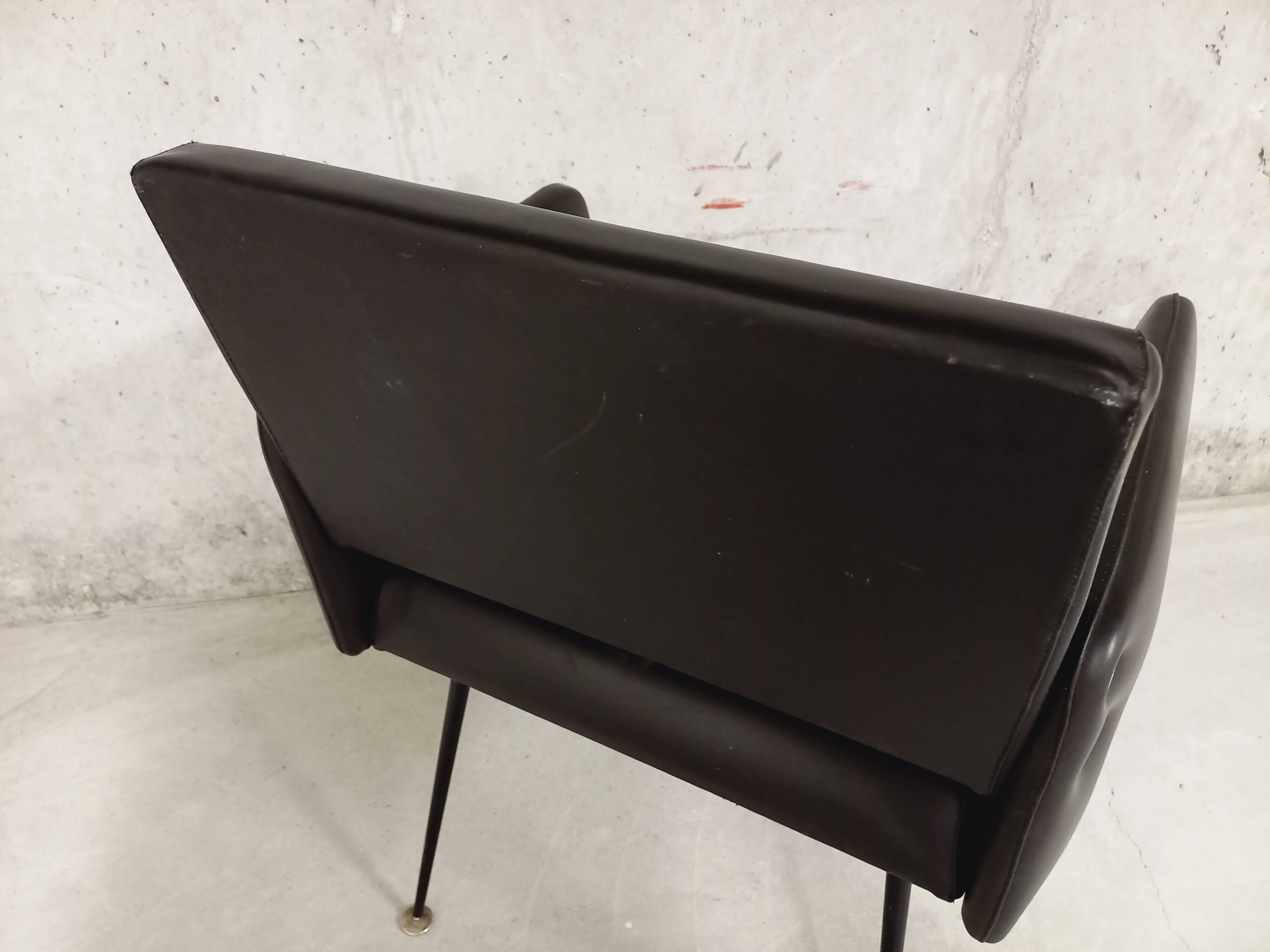 Vintage armchair in skai and black metal 60s