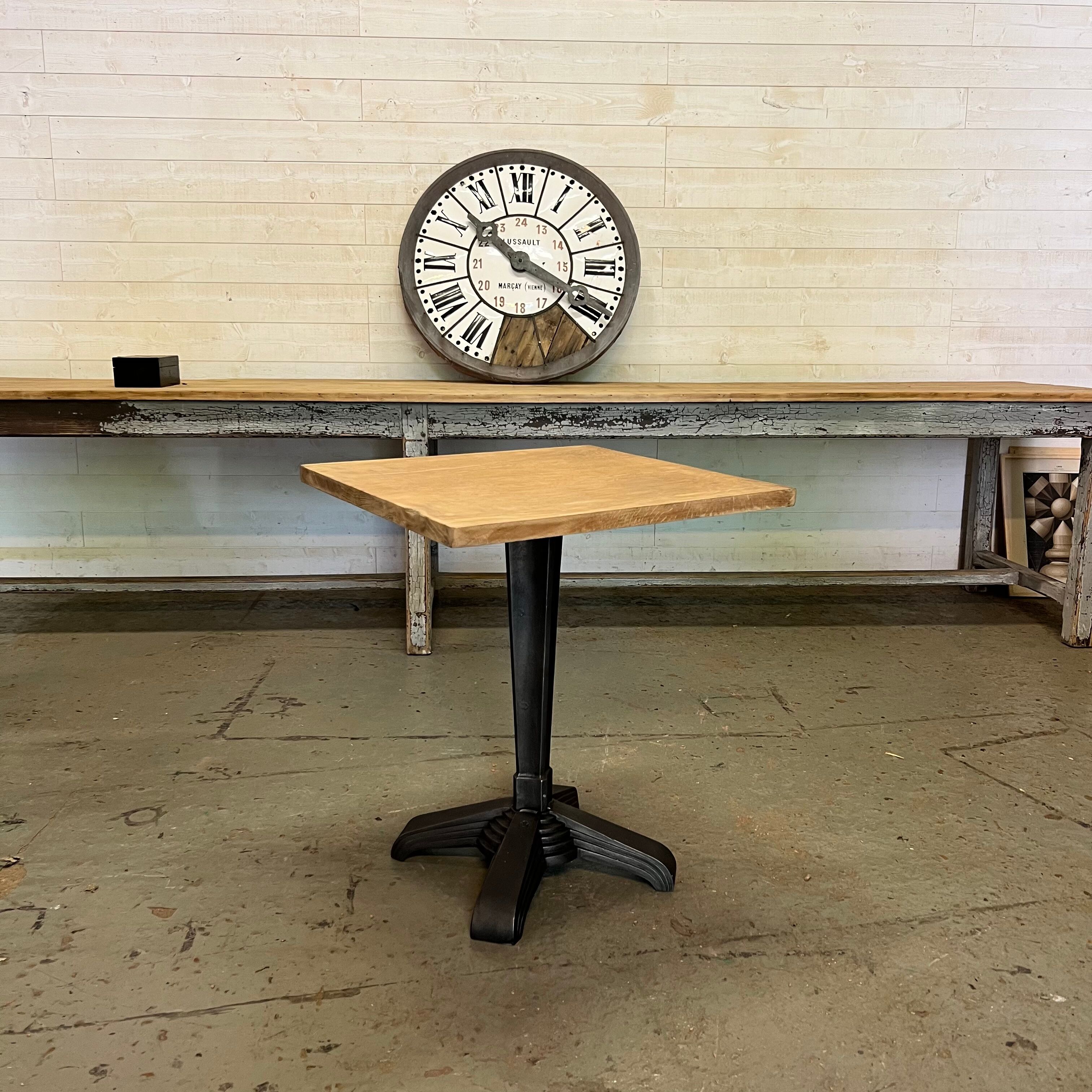 Old cast iron pedestal table brand LV