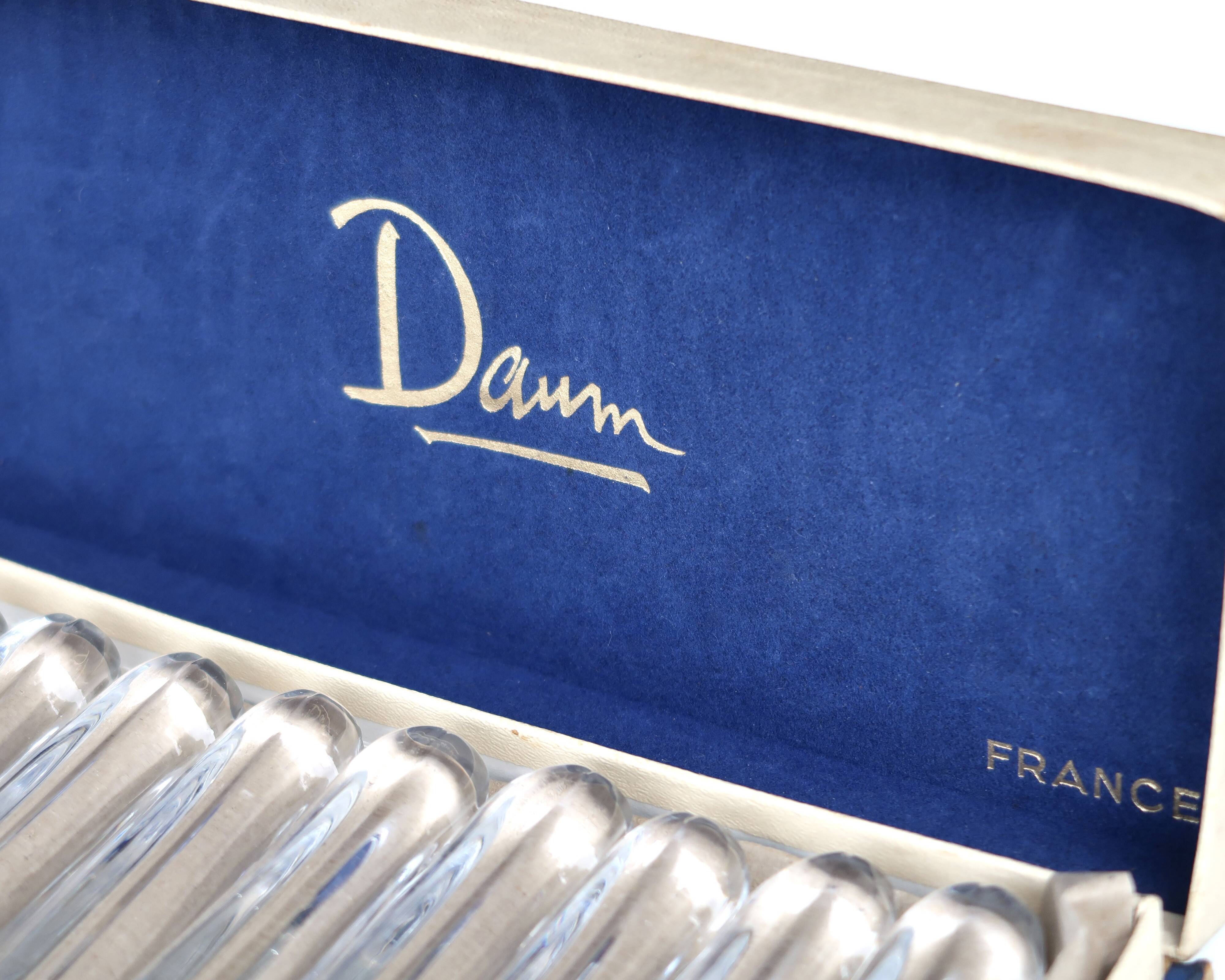 Set of 10 knife rests in a Daum France box, crystal, 1960s.