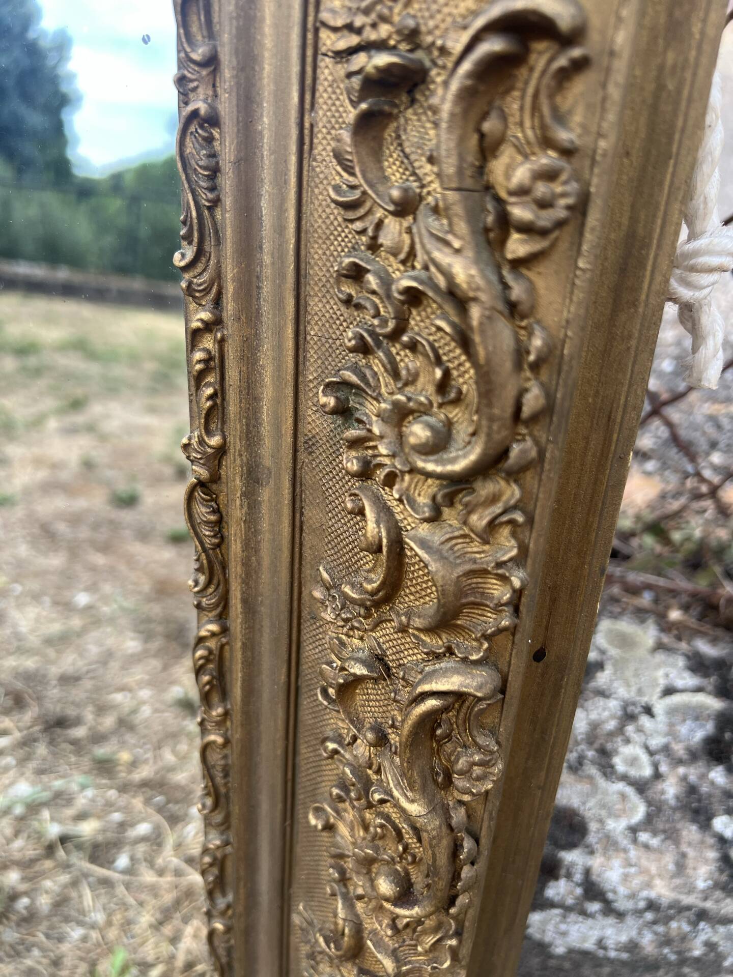 Large gilded sculpted Louis-Philippe mirror, mercury 104x77cm