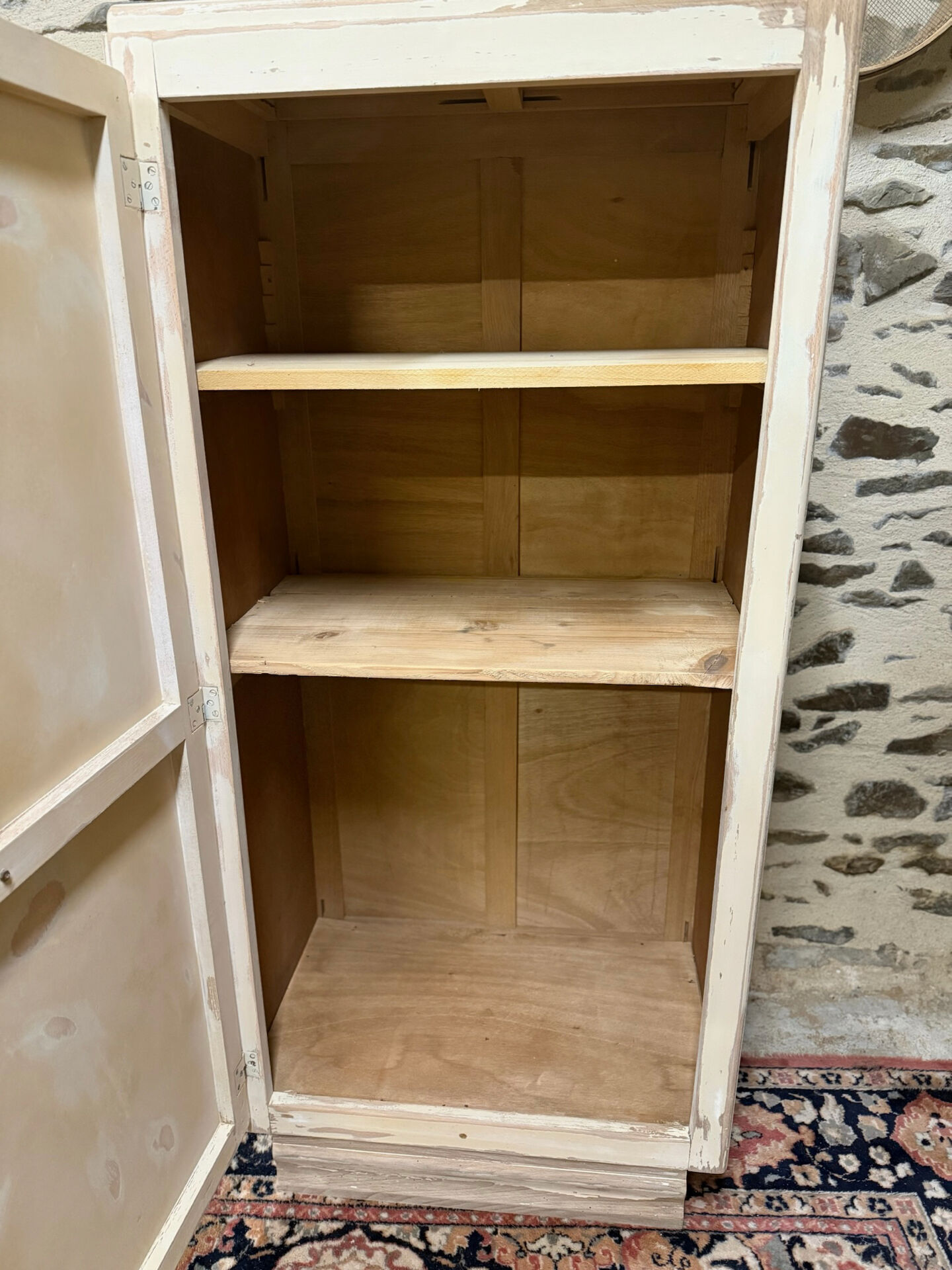 Small one-door Art Deco cabinet with a patina.