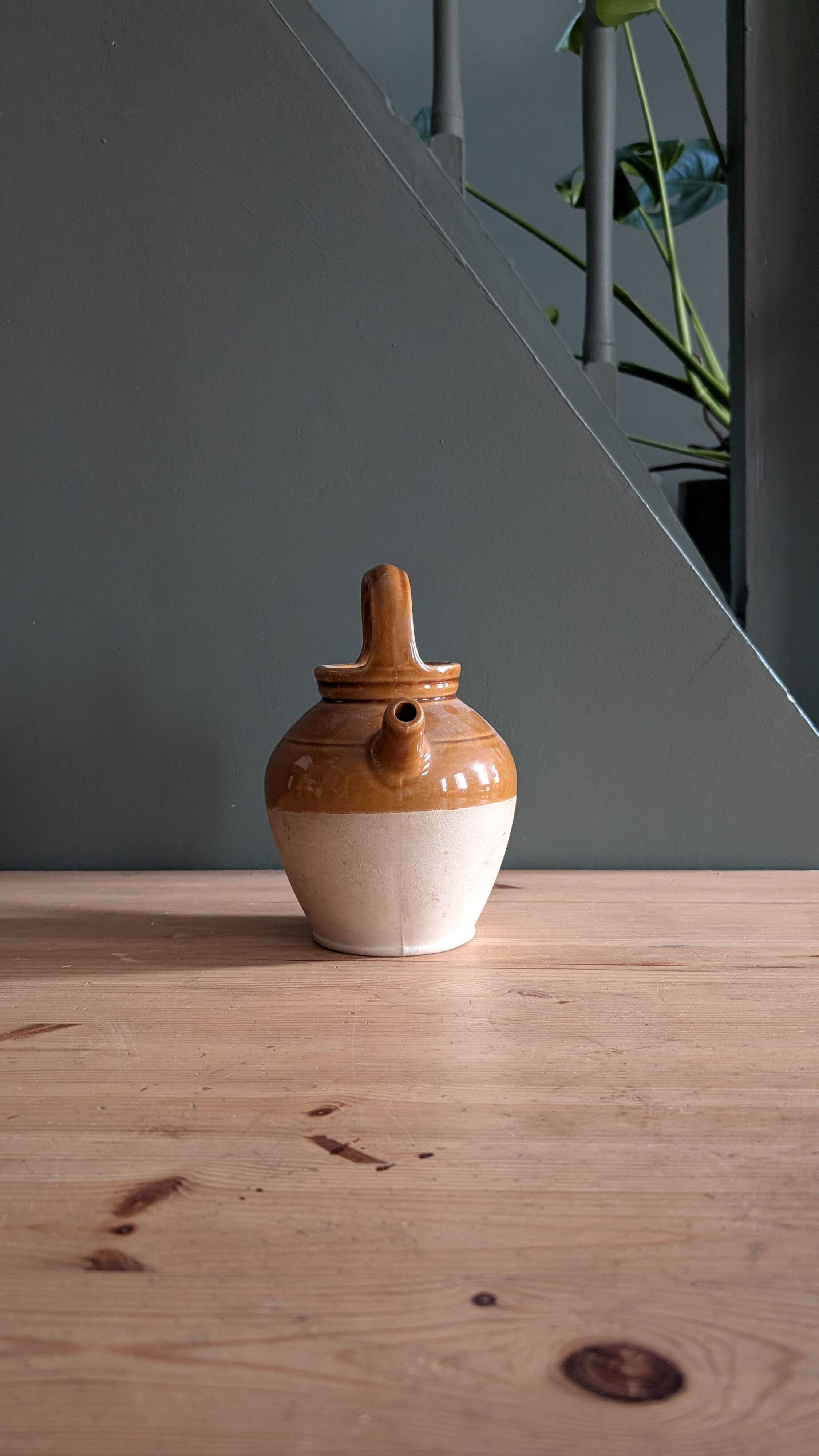 Glazed terracotta jug
