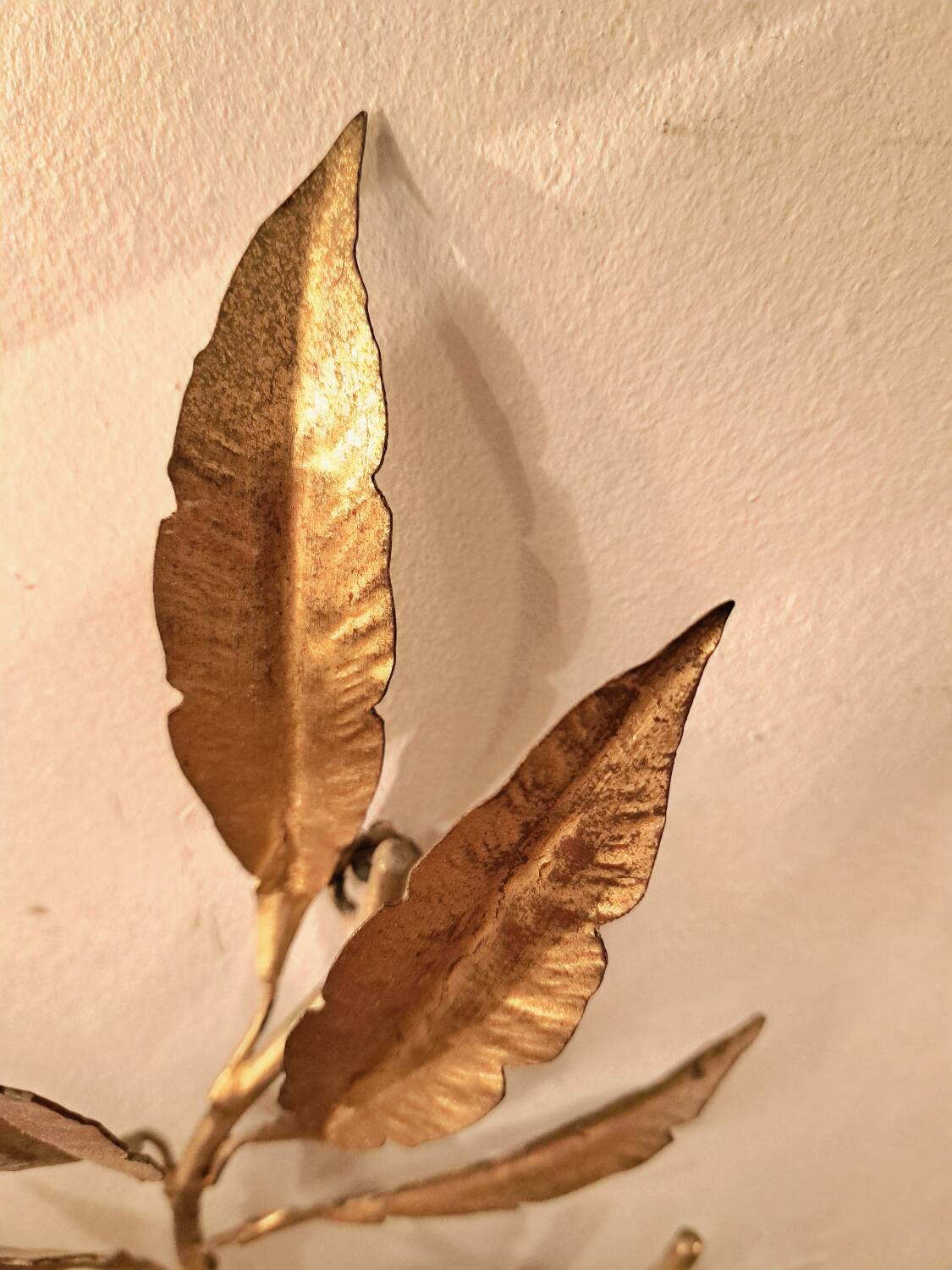 Pair of gold-tone metal leaf wall sconces