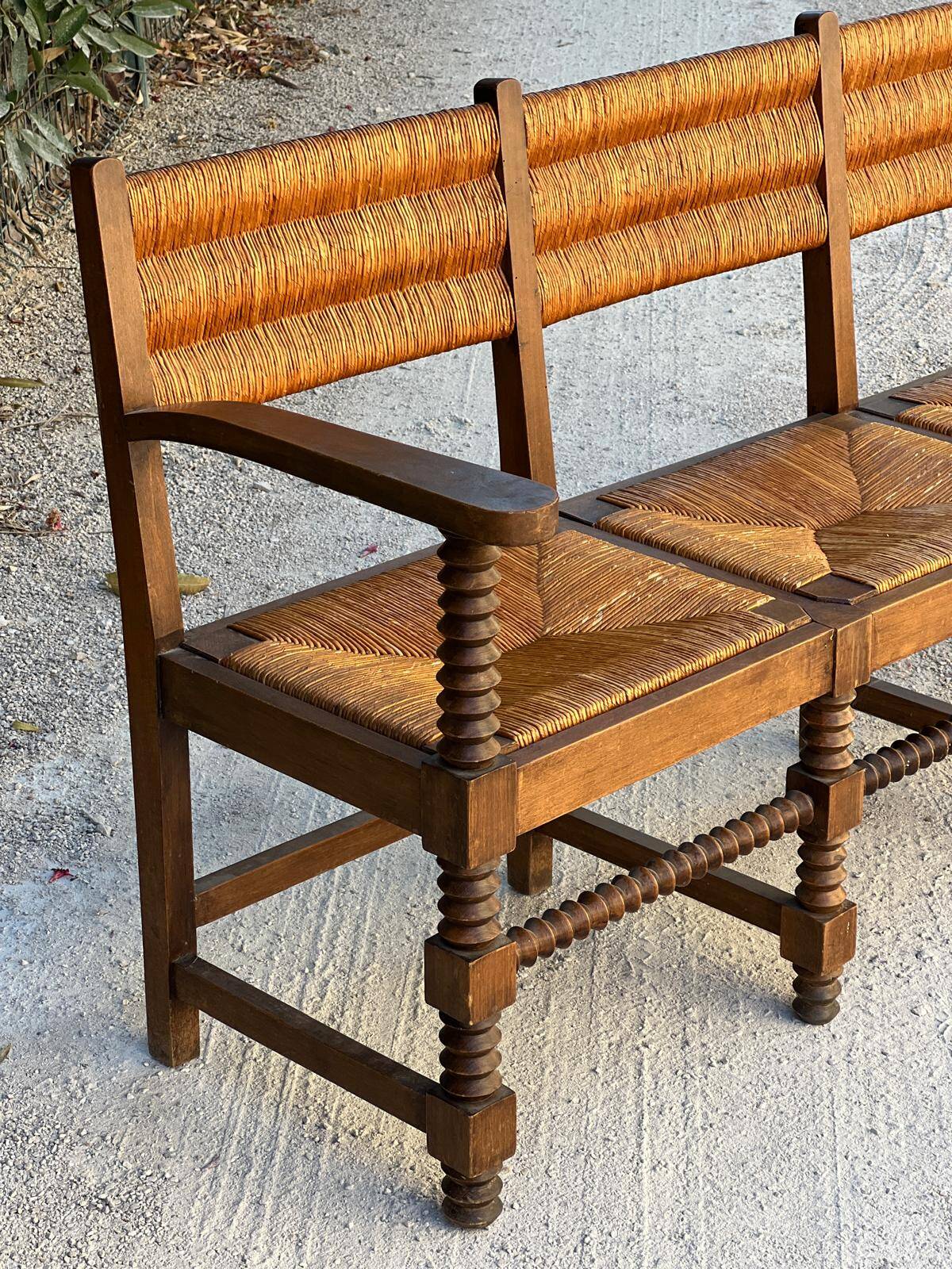 Solid oak bench and straw, French work from 1940.