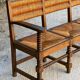 Solid oak bench and straw, French work from 1940.