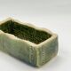 Rectangular ceramic vase signed, woven interior.