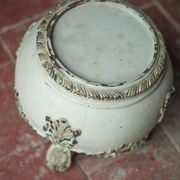 Solid wood plant stand with Louis XV style palm leaf motifs.