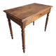 Antique French writing table in walnut with a drawer, circa 1900.