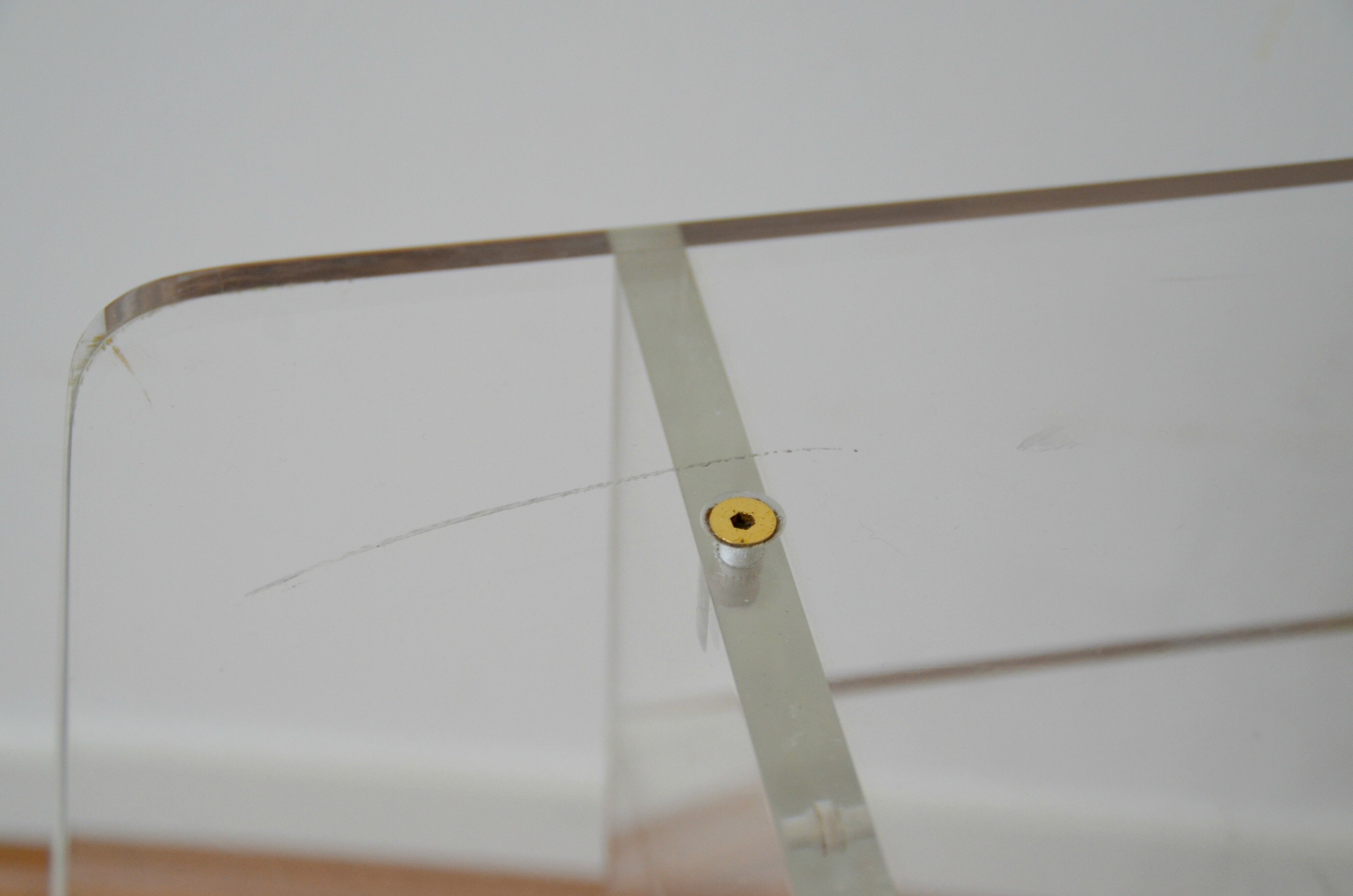 The swamp invisible Plexiglas side table