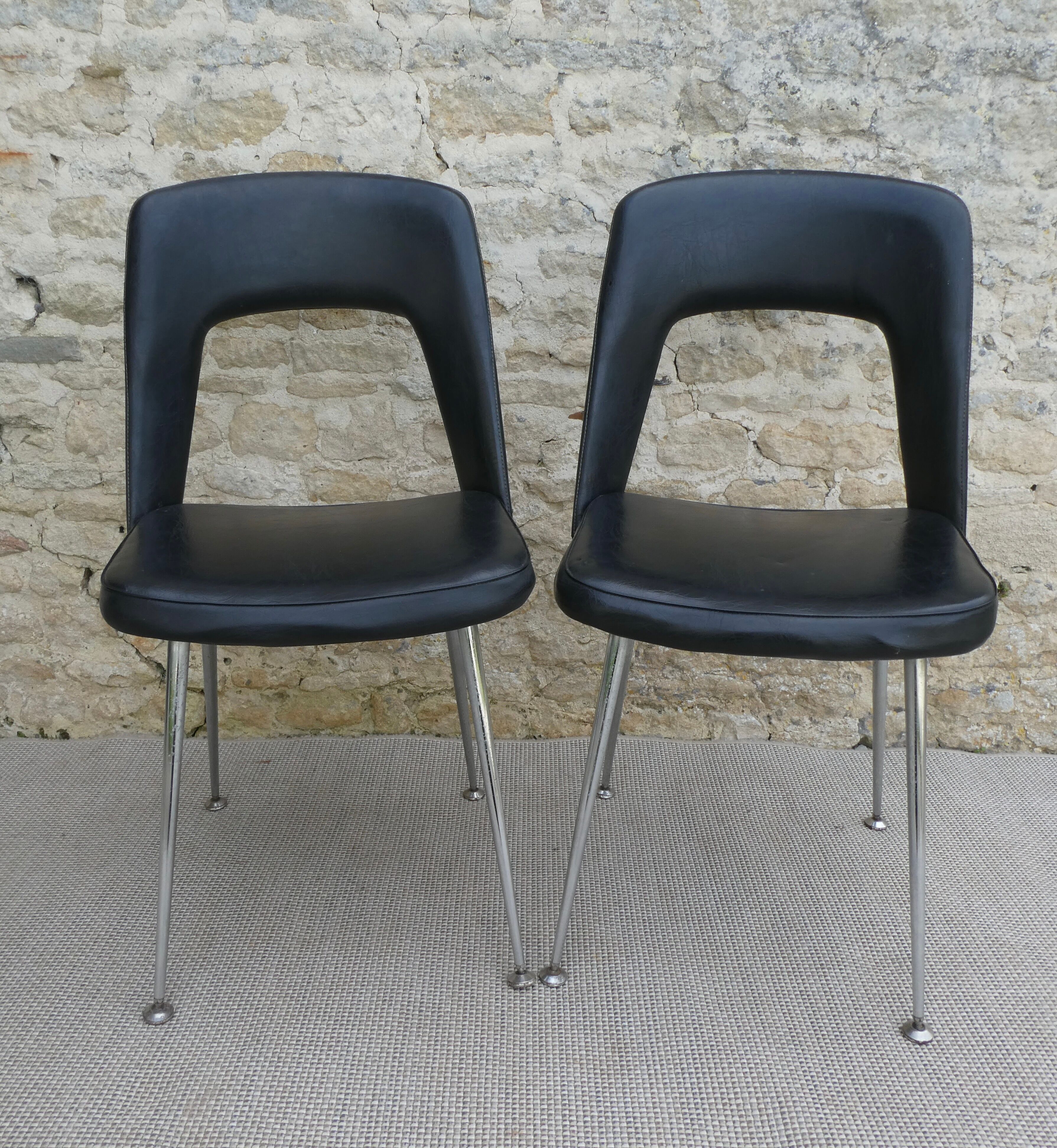Pair of office chairs in chromed metal and skaï, 60s