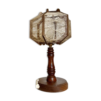 Wooden lamp and stretched wires