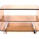Table basse roulante design en plexiglas
