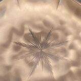 Metal dish with starry decoration