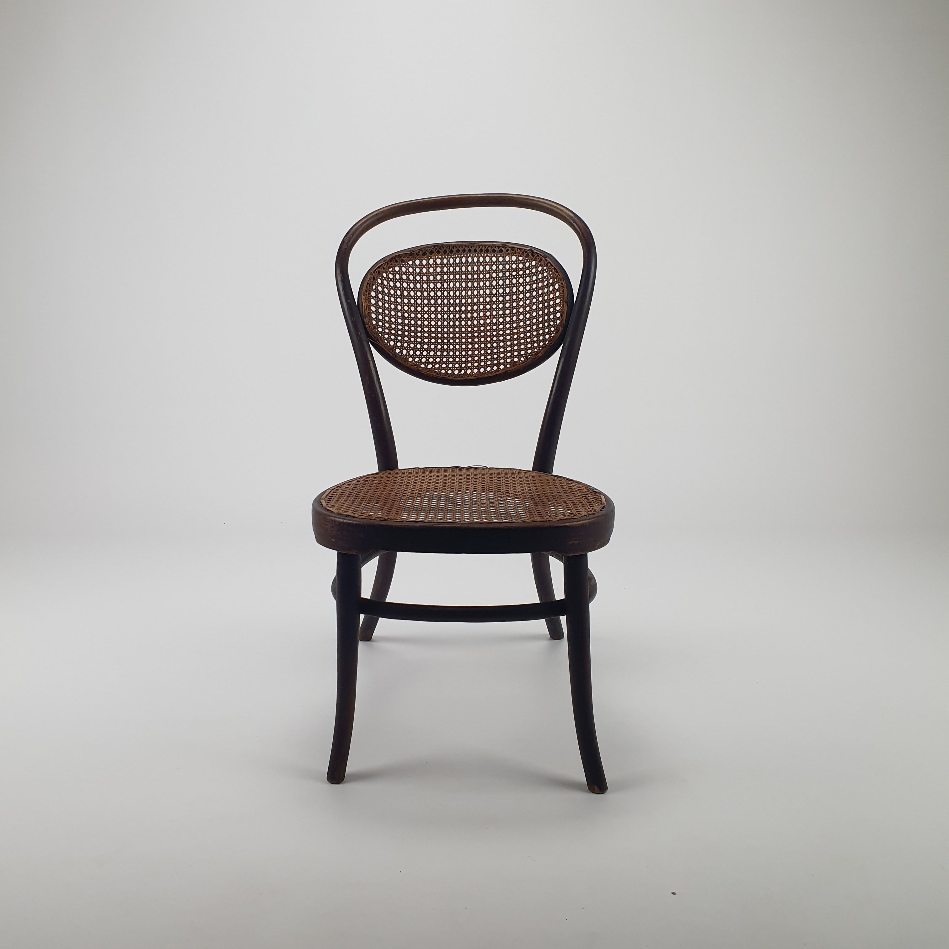 Bentwood and cane nursing chair by J&J Kohn, 1910