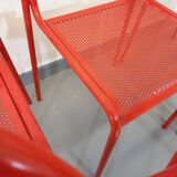 Set of 6 vintage red metal chairs from the 80s