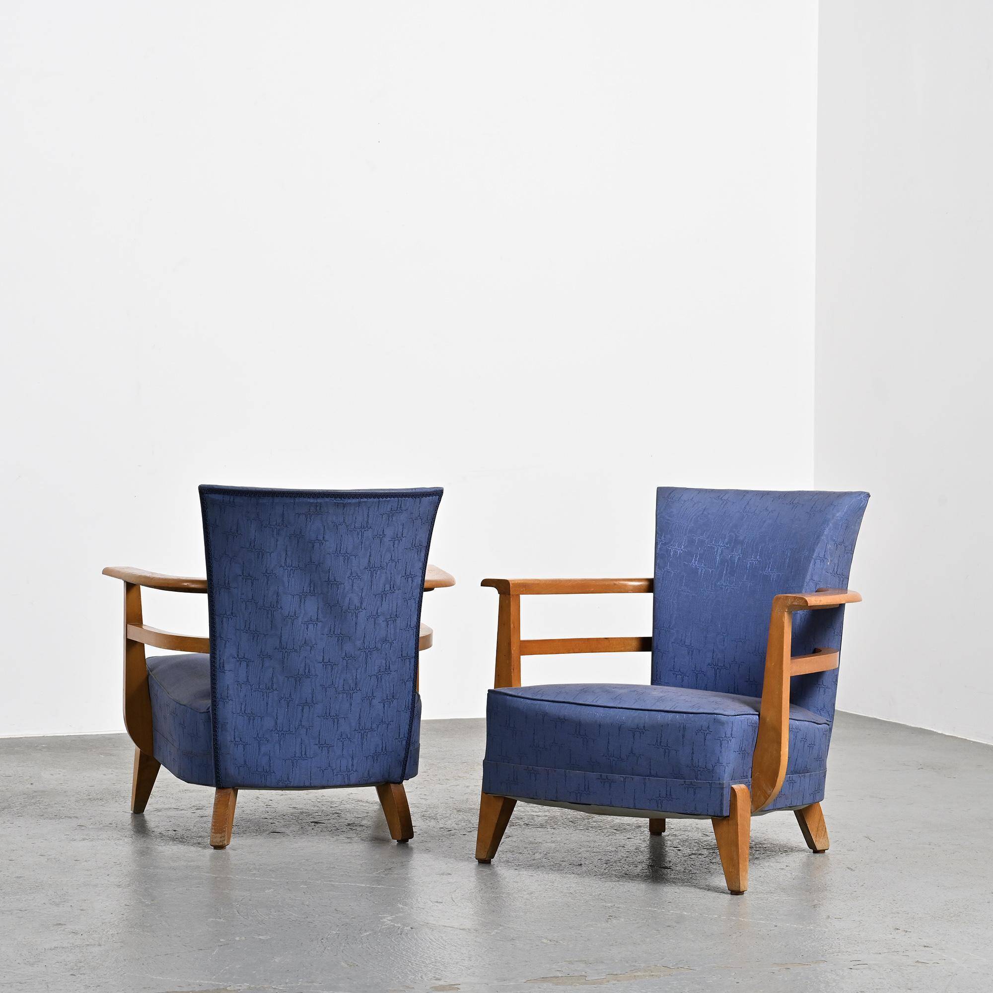 Pair of living room armchairs in solid beech, France, circa 1950.