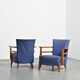 Pair of living room armchairs in solid beech, France, circa 1950.