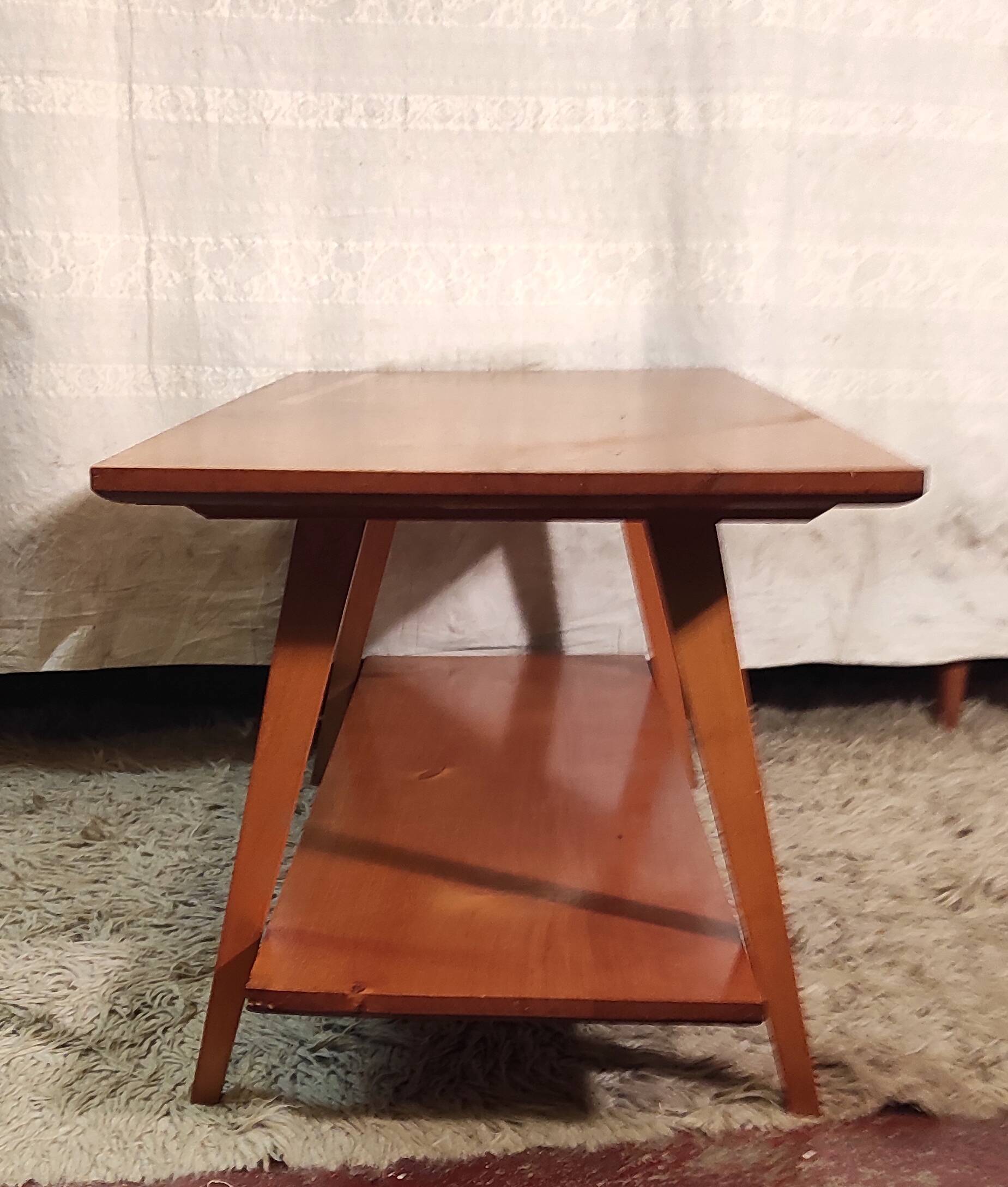 Solid wood coffee table with tapered legs - mid 20th century.