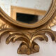 Petit miroir ovale signé Tallandier en laiton doré style Rococo – 30x2