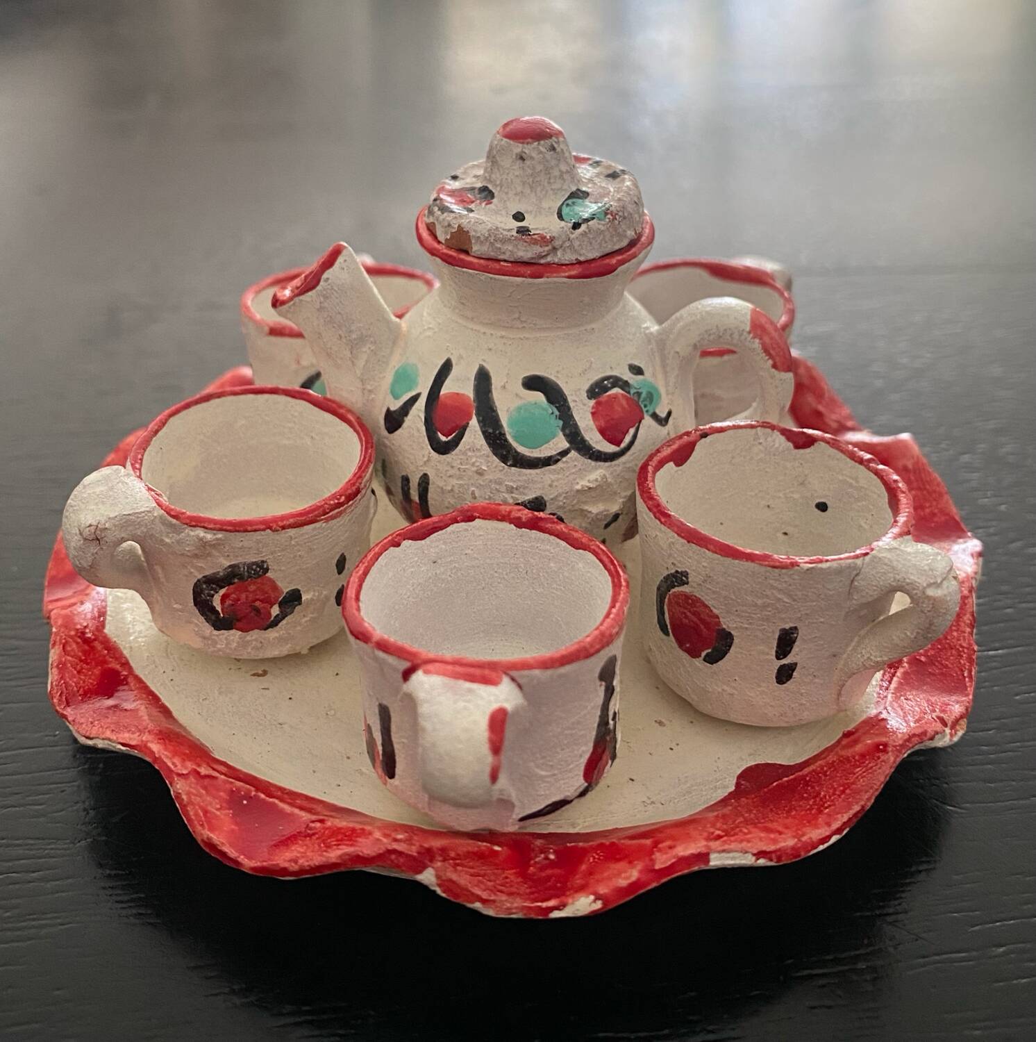 1 miniature terracotta dollhouse tea service