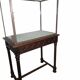 Antique display cabinet in 19th-century Gothic Revival style.