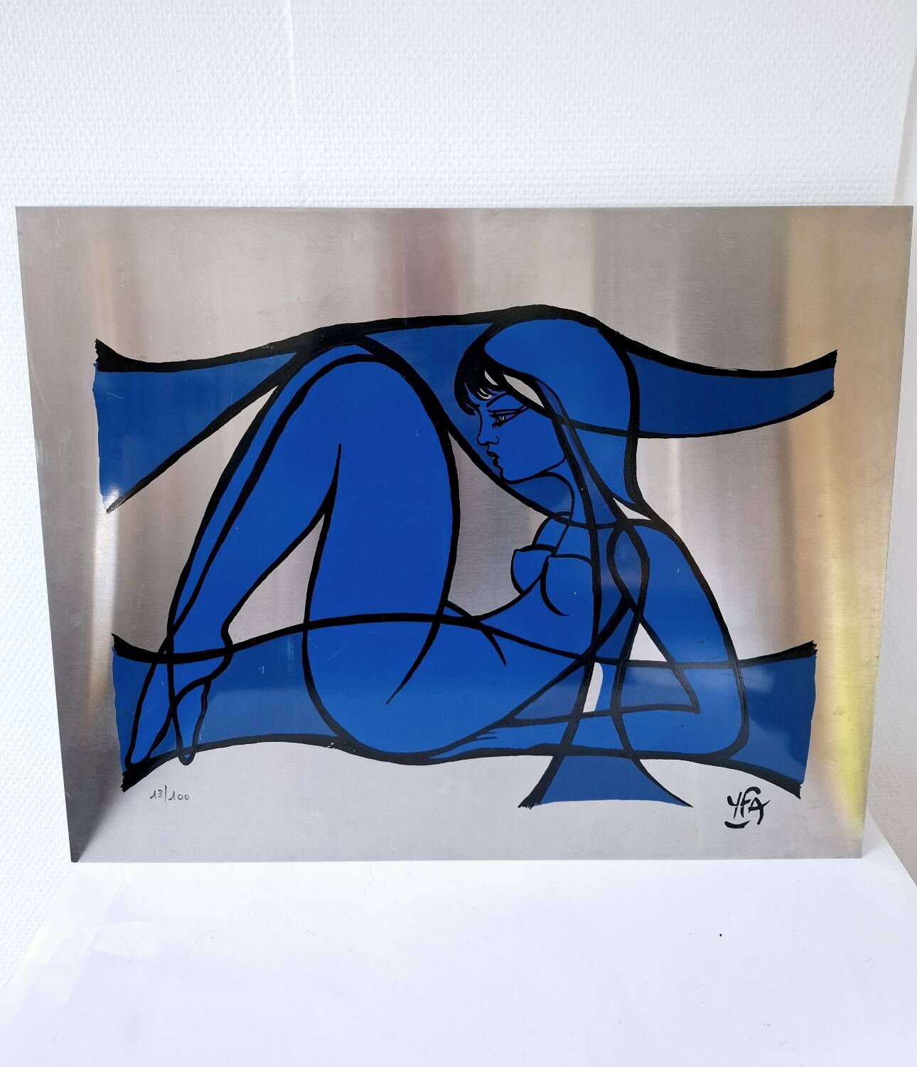 Silkscreen on brushed aluminium from the 1970s.