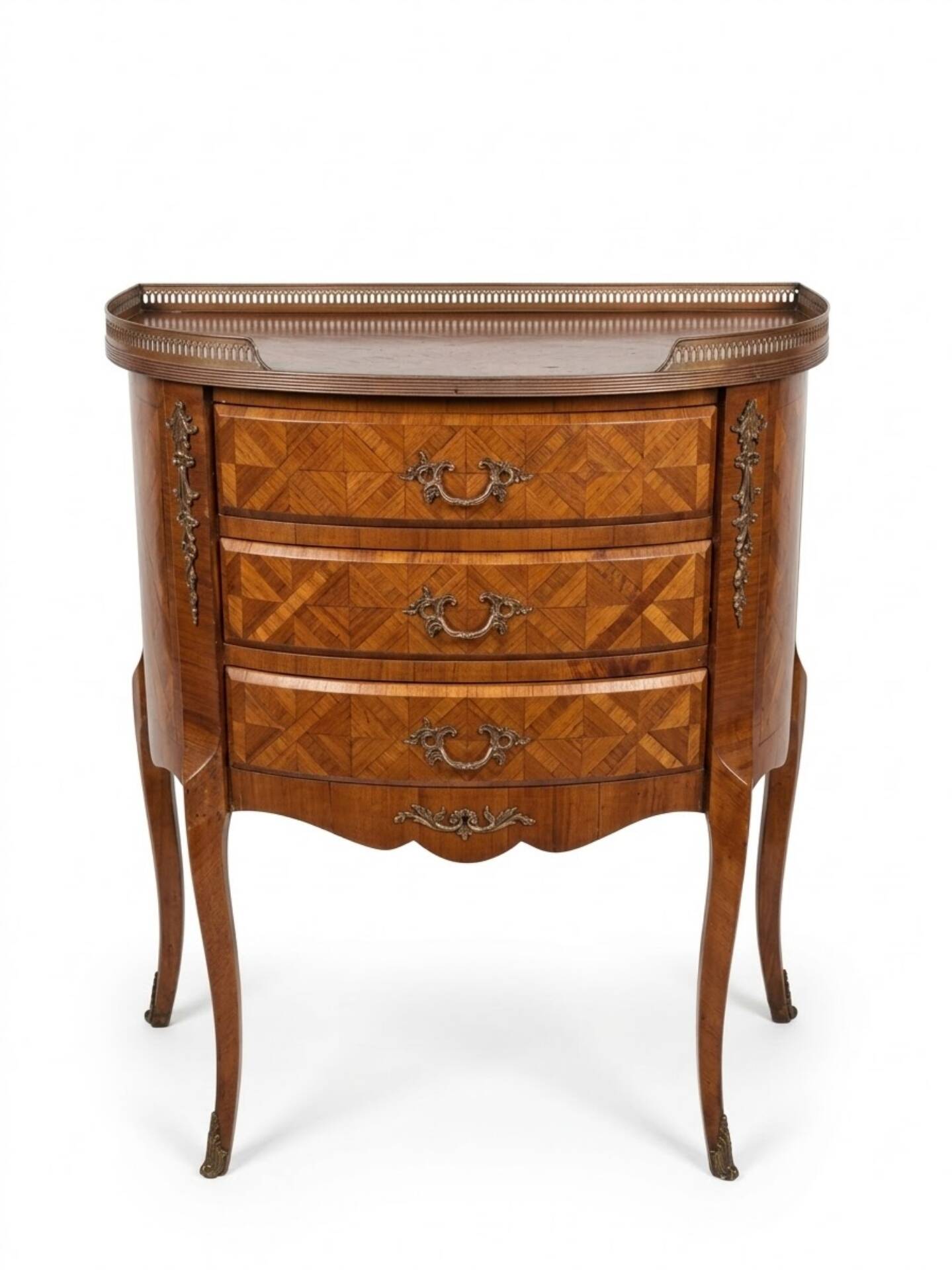 Small curved chest of drawers in Louis XV style with marquetry.