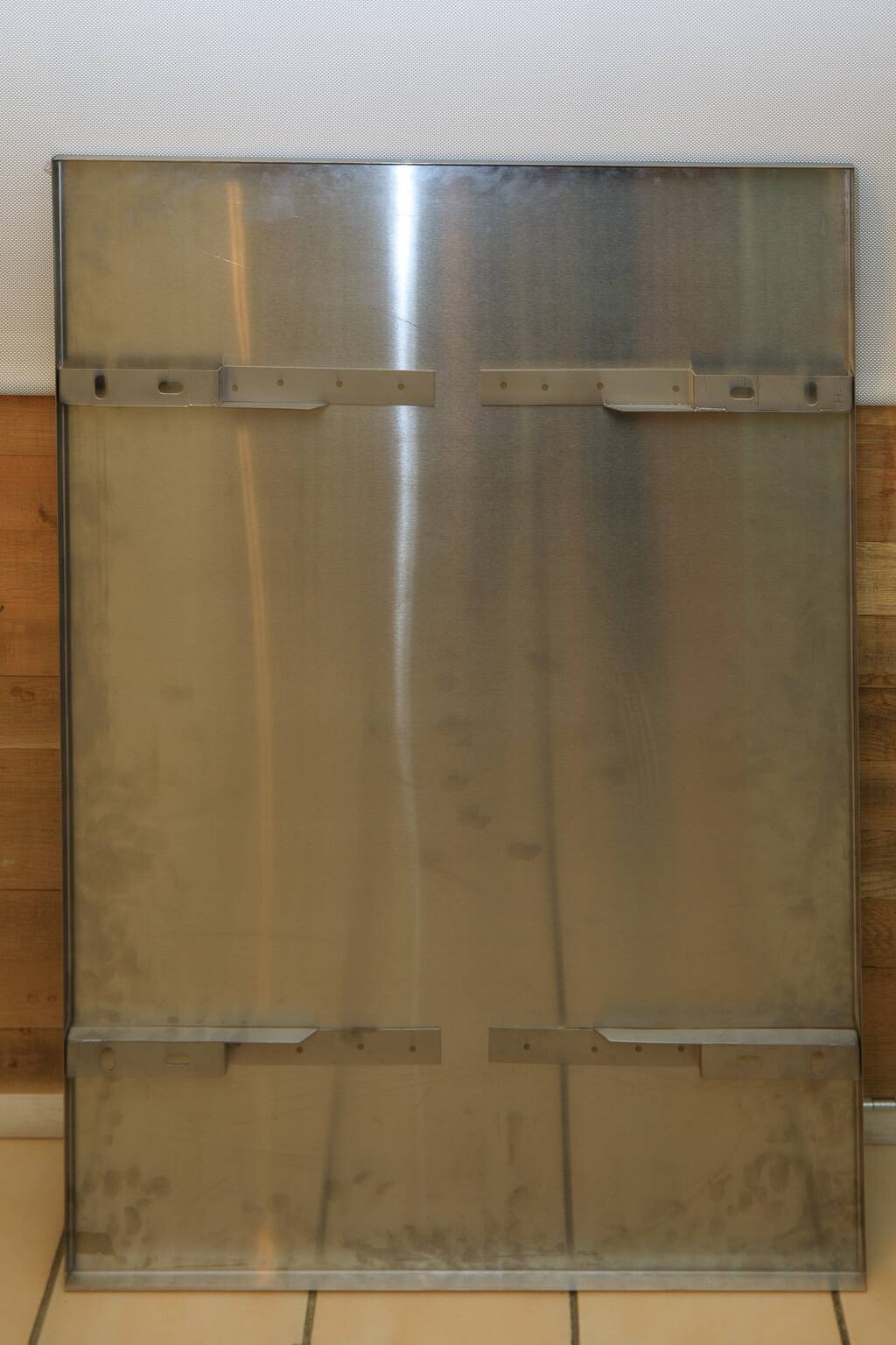 large smoked mirror on brushed aluminium