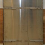 large smoked mirror on brushed aluminium