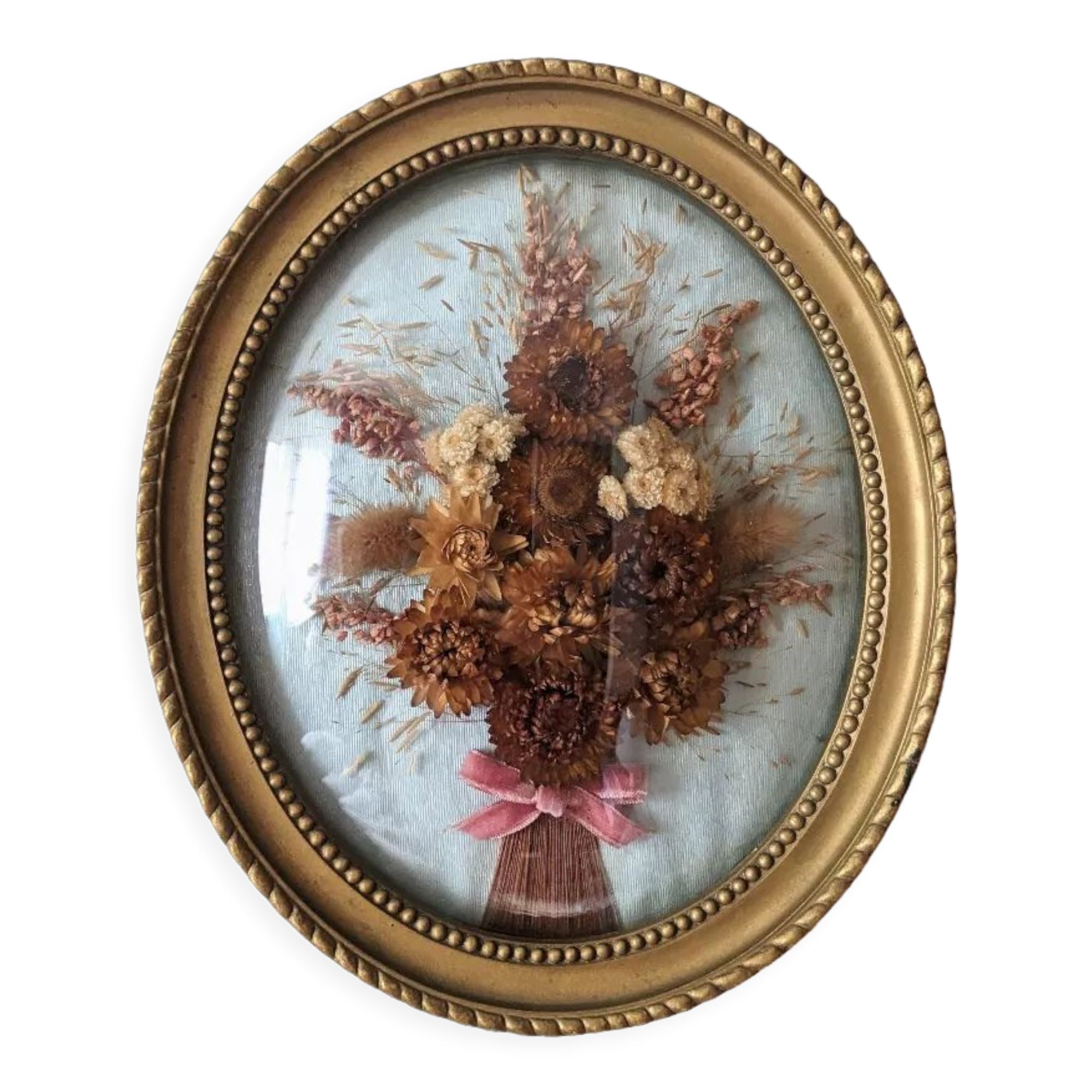 Golden vintage frame with bouquet of dried flowers under globe, wedding bouquet, antique bouquet