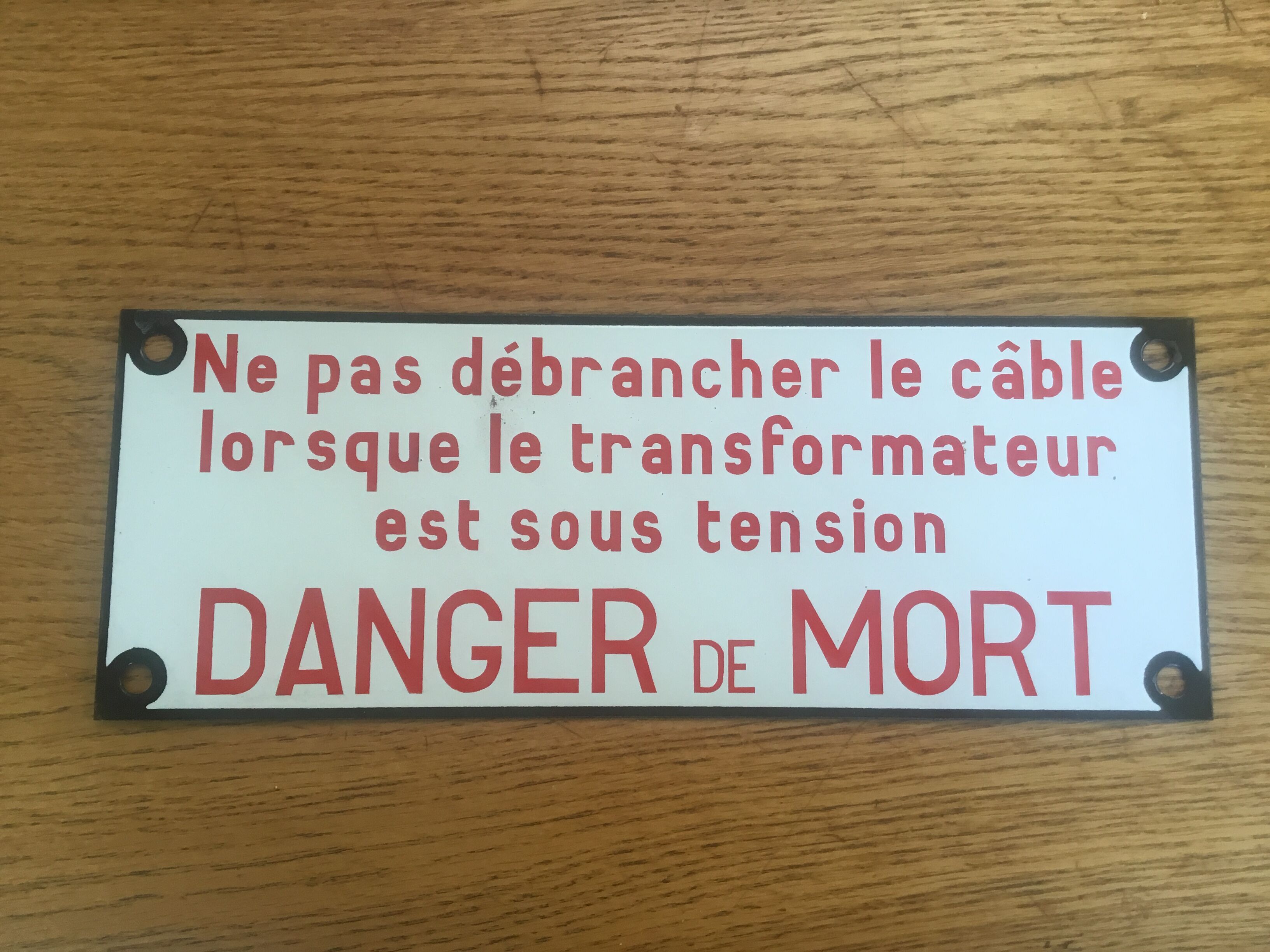 Enamelled security plate