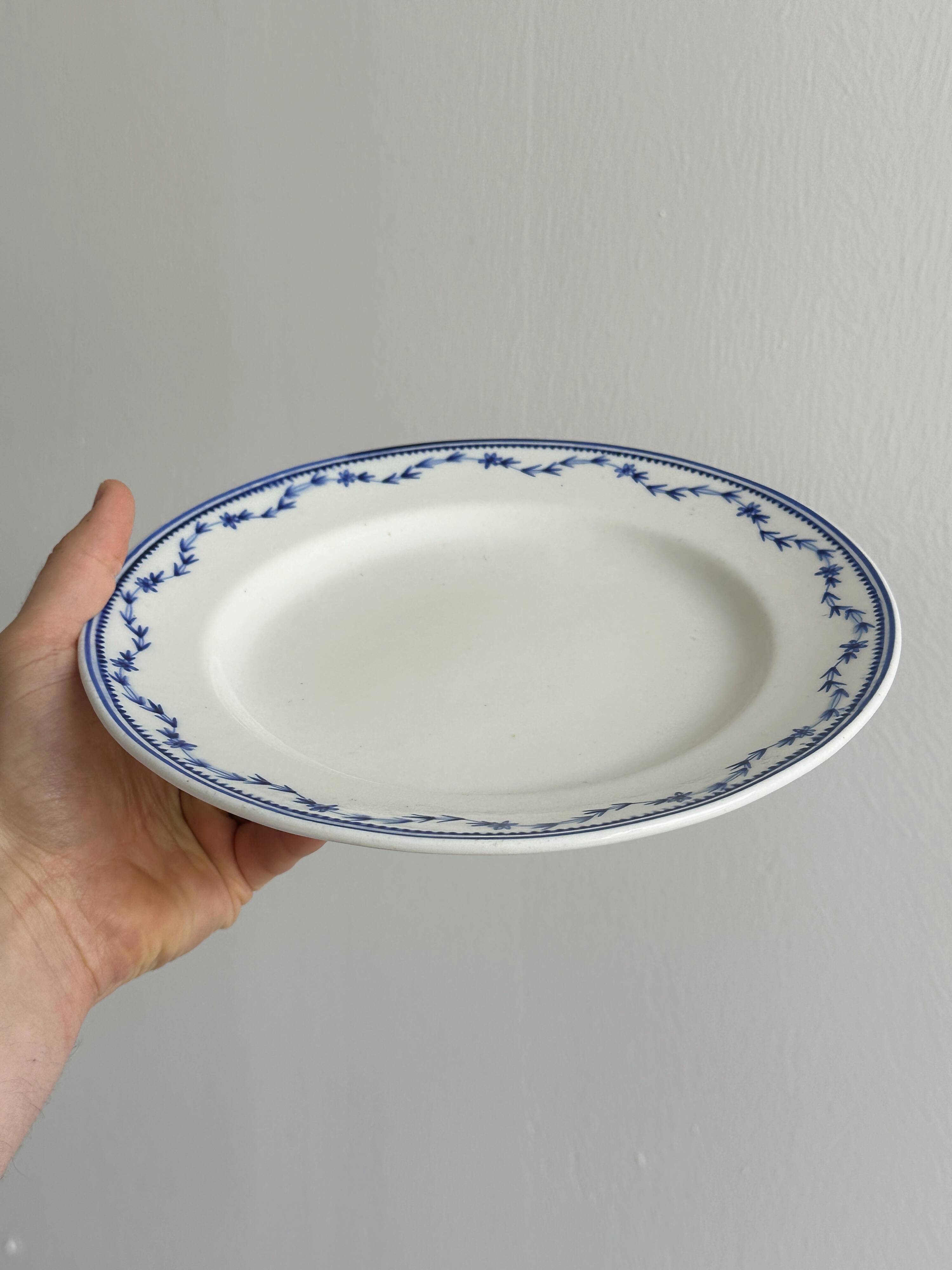 4 antique ceramic plates with blue flowers