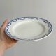4 antique ceramic plates with blue flowers
