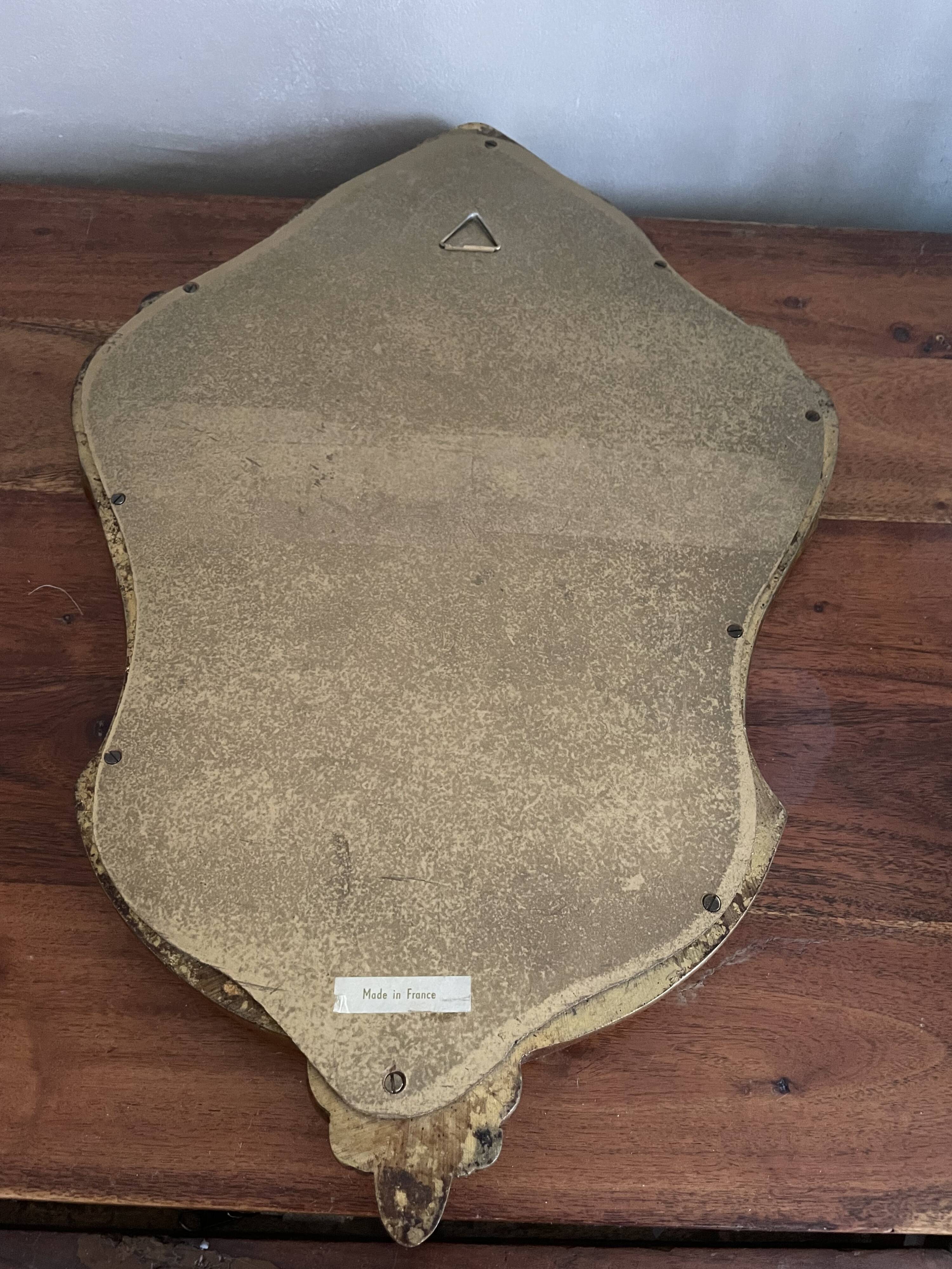 Baroque style mirror in gilded wood