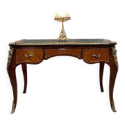 Antique French-style desk with green leather top and bronze mounts