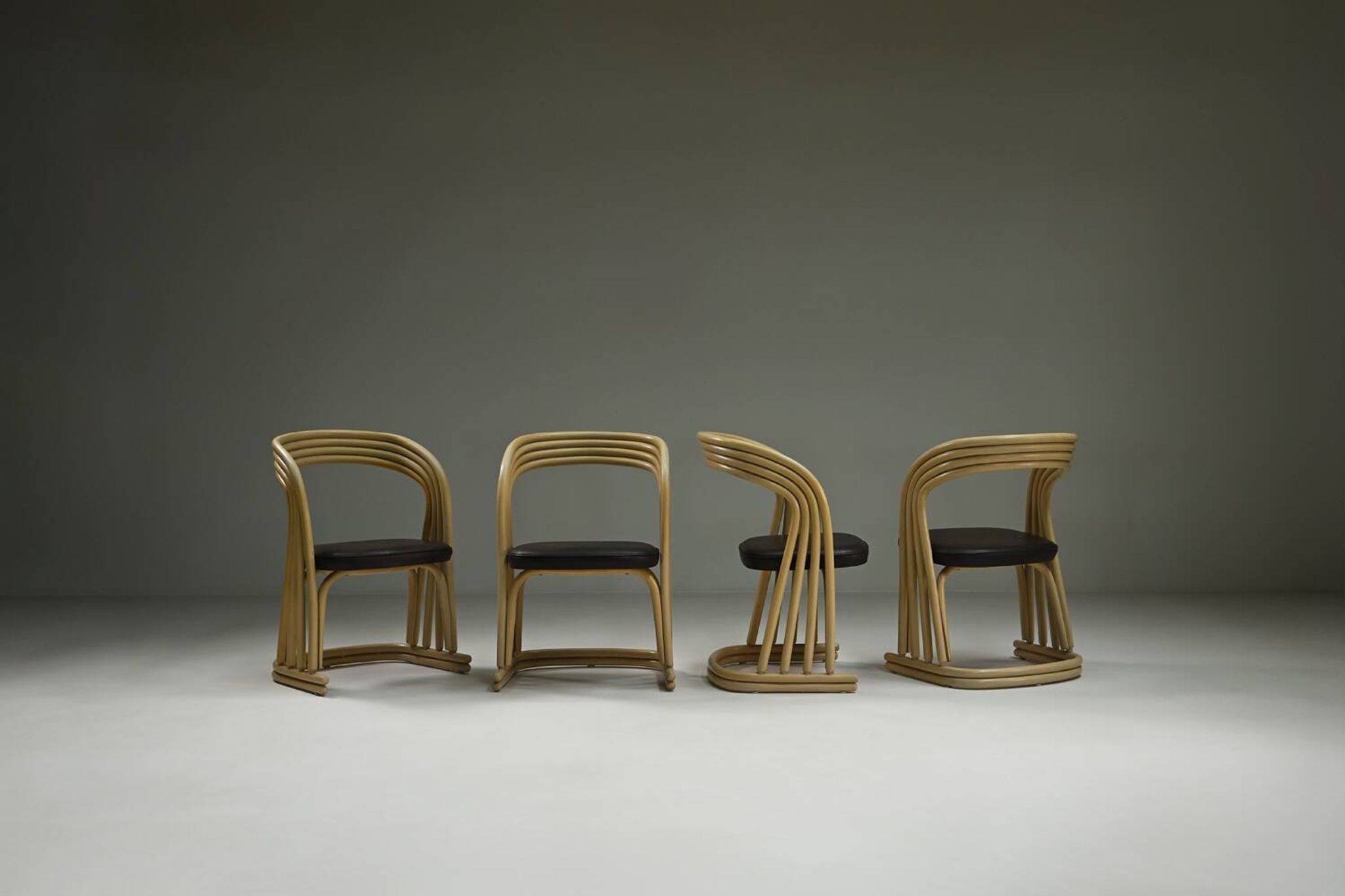 Set of 4 rattan dining chairs, 1980s Italy.