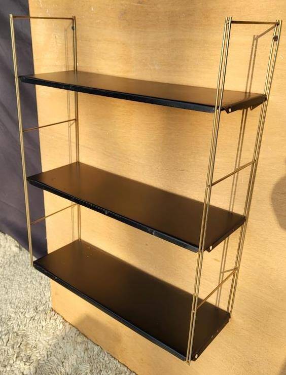 Tomado style black metal string shelf with gold ladder
