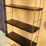 Tomado style black metal string shelf with gold ladder
