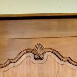 Louis XV rustic bonnetière in solid cherry wood, late 19th to early 20th century.