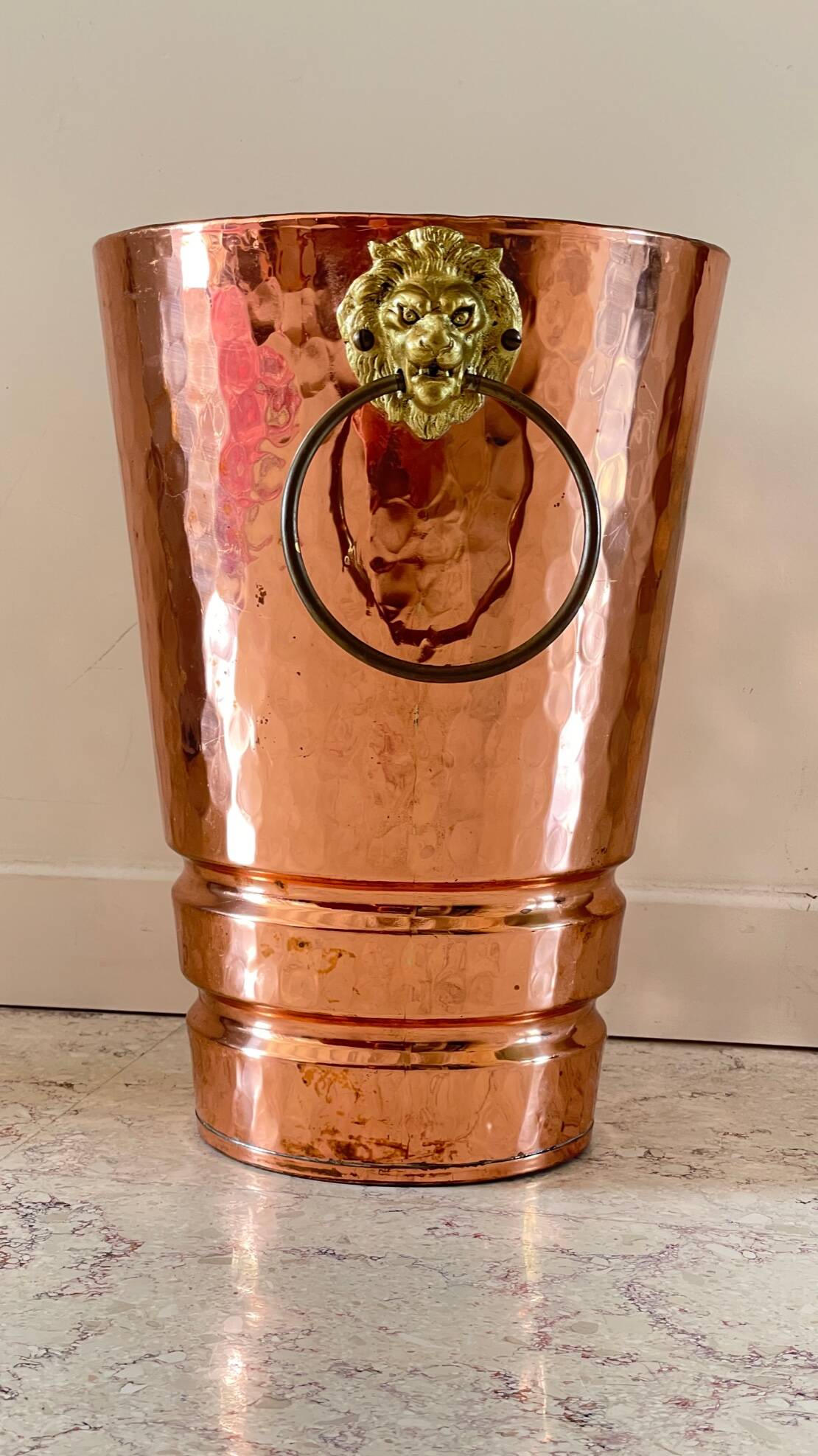 Vintage copper lion's head umbrella holder