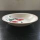 Large hollow dish with poppy decoration